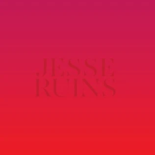 Jesse Ruins - A Bookshelf Sinks Into The Sand