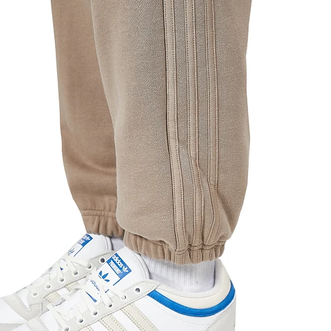adidas - Reveal Essentials Sweatpants (Chalky Brown) | HHV