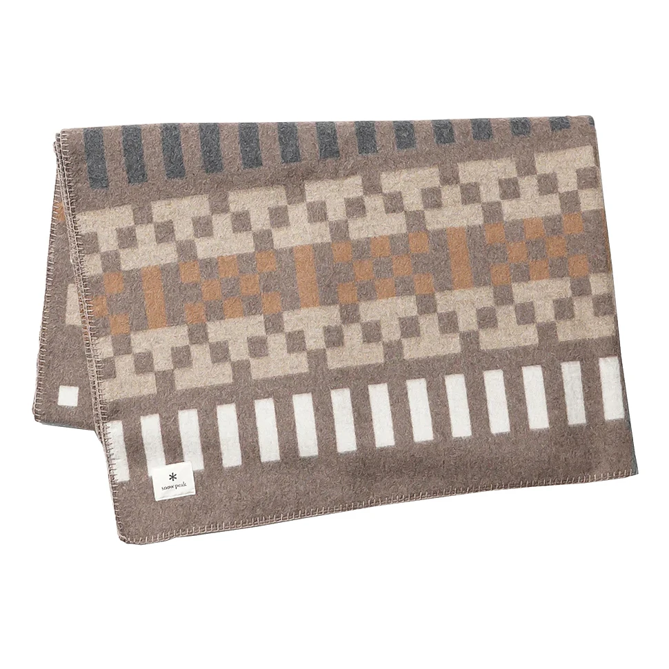 https://a0.cdn.hhv.de/items/images/generated/970x970/01021/1021988/1-snow-peak-recycled-wool-blanket-brown.webp